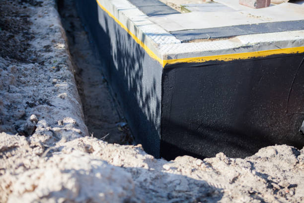 Professional Interior Drainage System technician working in Williston Park, NY